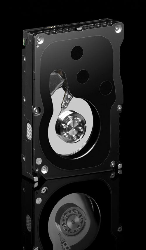 Western Digital WD1500ADFD Raptor Hard Disk displayed against a dark background showcasing its design and components, including the spindle and platters.