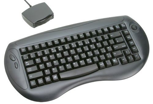 A Hi-Grade µDMS P60 ergonomic keyboard with an attached wrist rest and a small, detached trackball module.