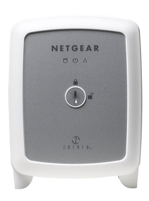 Front view of a Netgear Storage Central SC101 device with a white casing and grey front panel featuring the Netgear logo and power indicator symbols.