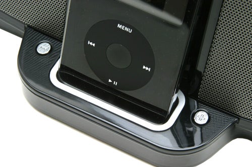Close-up view of an iPod docked in the Acoustic Authority iRhythms iPod Speaker Dock, showing the control interface and speaker grille.