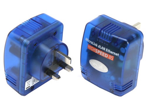 Devolo MicroLink dLAN Highspeed Ethernet Starter Kit with two powerline adapter units showing the front and back side with European-style power plugs.