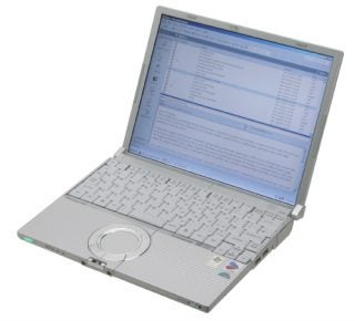 Panasonic ToughBook CF-W4 laptop opened and displaying a screen with several rows of files and applications, with a focus on the silver keyboard and circular trackpad.