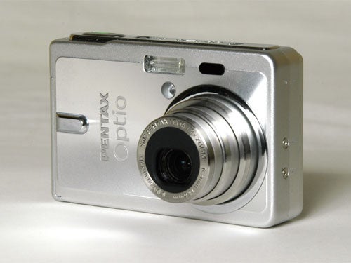 Pentax Optio S6 digital camera displayed on a white background with lens extended.