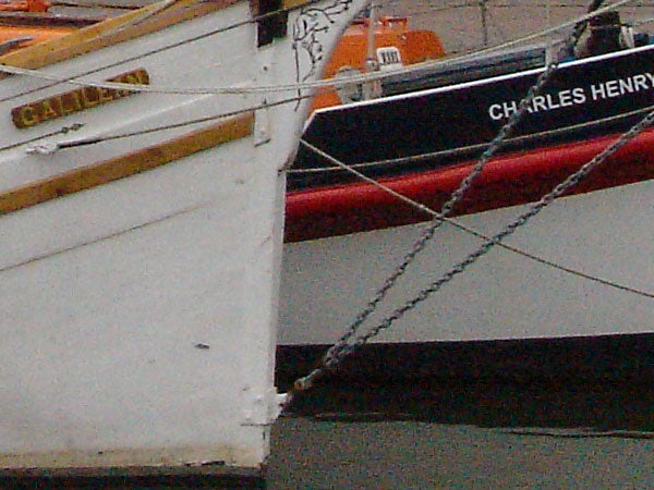 Close-up of boats' hulls and mooring lines with 