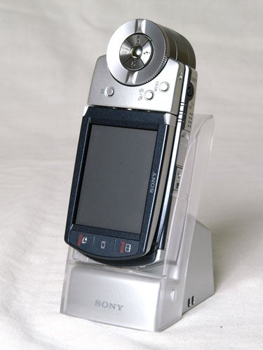 Sony Cyber-shot DSC-M2 camera on a white stand.