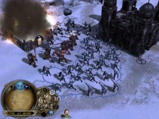 A screenshot from the video game Lord of the Rings: Battle for Middle Earth II showing a battle in progress with various fantasy units clashing near a fortress amidst a snowy landscape, with the user interface displaying resources and character portraits at the bottom.