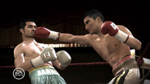 Screenshot from the video game Fight Night Round 3 showing two boxers in the middle of a match, with one landing a punch on the other in a boxing ring.