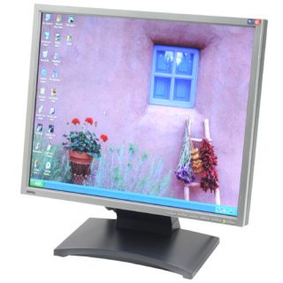 BenQ FP93GX 19-inch LCD monitor displaying desktop wallpaper.
