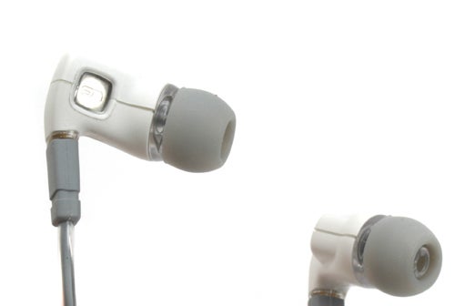 Close-up of Ultimate Ears super.fi Pro In-Ear Headphones showing the earbud design and cable connection on a white background.