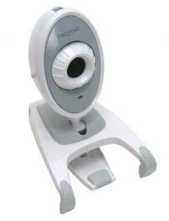 Creative WebCam Instant Skype Edition mounted on its stand, with the company's logo visible on the camera's face.