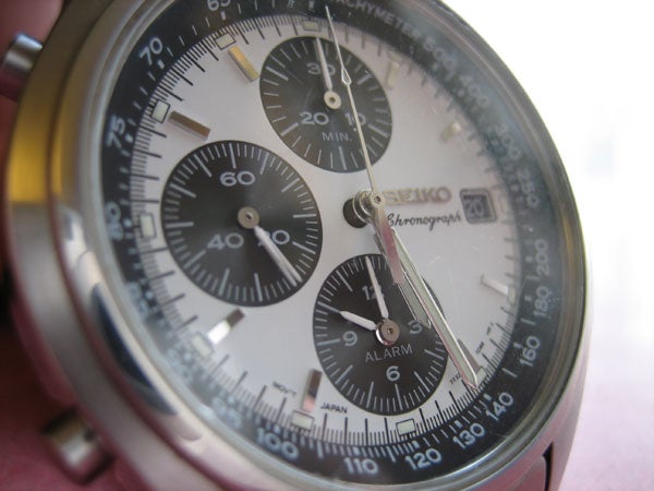 Close-up of a Seiko chronograph wristwatch showing time and stopwatch features.