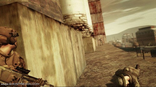 A screenshot from the video game Ghost Recon: Advanced Warfighter showing a soldier in combat gear aiming a rifle around a corner with a downed enemy in the foreground.