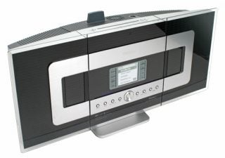 Philips WACS700/05 Wireless Music Station with display screen, control buttons and a pair of integrated speakers in a sleek black and silver design.