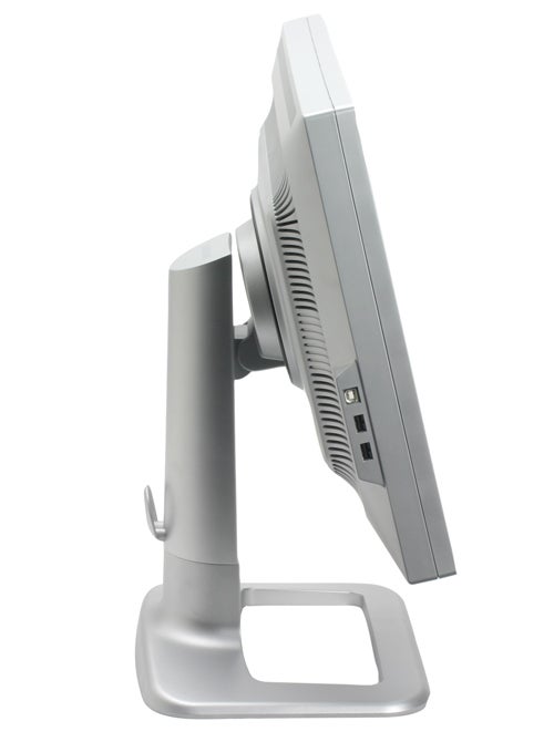 Side view of a Samsung SyncMaster 244T LCD monitor showcasing its slim profile, adjustable stand, and side panel ports.