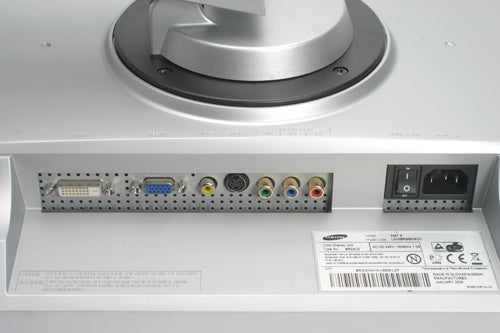 Samsung SyncMaster 244T monitor's rear input/output panel showing various connectivity ports including DVI, VGA, S-Video, composite, and component inputs, along with the power socket and product label.