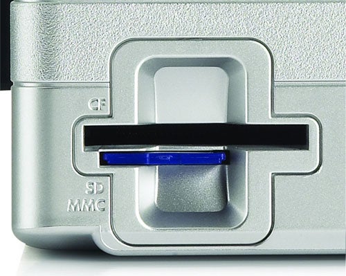 Close-up of the HP DeskJet 460wbt printer's Secure Digital (SD) memory card slot with a blue SD card inserted.