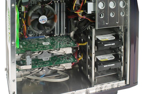 Interior view of Wired2Fire Pyro 64-FX computer showing the motherboard, graphics cards, and hard drives with power supply cables visibly connected.
