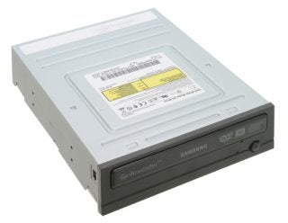 Samsung WriteMaster SH-W163 DVD writer with a silver finish, showing front panel with DVD R/RW logo, eject button, and emergency eject hole.