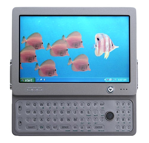 OQO model 01+ Tablet Edition with a screen displaying tropical fish wallpaper and a QWERTY keyboard below the screen.