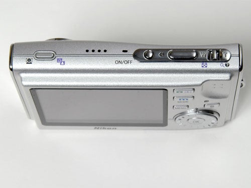 Nikon Coolpix S5 digital camera showing the back panel with LCD screen, control buttons, and on/off switch.