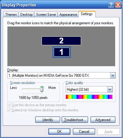 Display properties dialog box showing settings for multiple monitors on an NVIDIA GeForce Go 7800 GTX, with screen resolution set to 1680 by 1050 pixels and color quality at highest (32 bit).