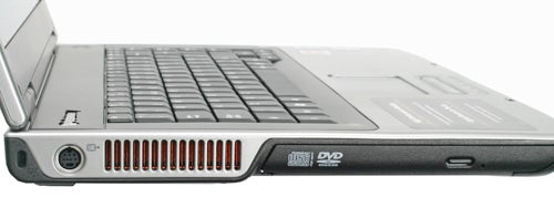 Close-up side view of a Gateway MX6640b laptop showing the keyboard, DVD drive, various ports, and part of the screen hinge.