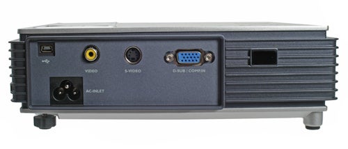 Rear view of a BenQ CP120 wireless projector showing connectivity ports including video, S-video, VGA, and power supply inputs.