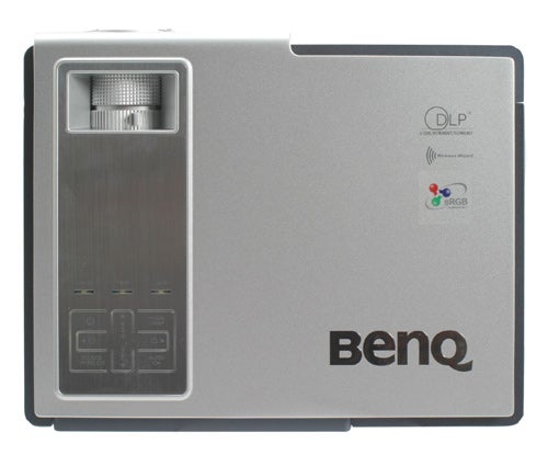 Top view of a BenQ CP120 wireless projector with a silver finish, featuring the DLP and sRGB logos, along with control buttons on the surface.