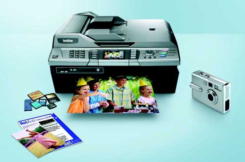 Brother MFC-820CW multifunction printer with fax and media card slots displayed on a light blue background, printed photos, and a compact digital camera.