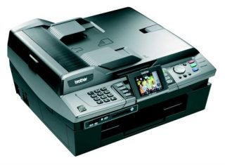 Brother MFC-820CW multifunction printer with fax and photo capture capabilities, featuring an LCD display and multiple function buttons.