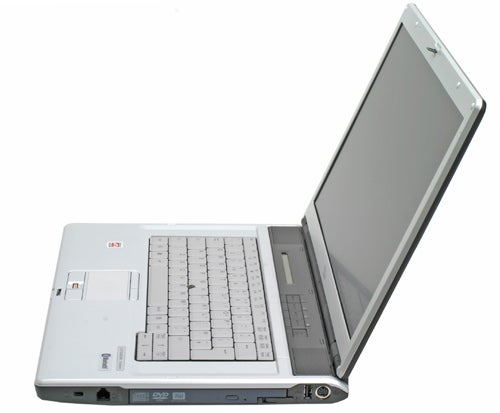 Fujitsu-Siemens LifeBook E8210 notebook with a silver case and white keyboard, open and powered off, isolated on a white background.