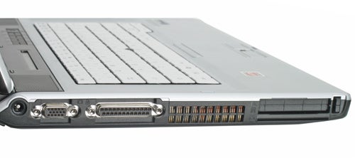 Side view of a Fujitsu-Siemens LifeBook E8210 notebook, showing the keyboard, VGA, and docking station ports.