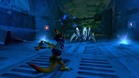 Screenshot from the video game featuring the character Daxter, in an action pose inside a dimly lit, industrial environment, facing glowing-eyed creature adversaries ahead.