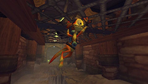 Daxter, an animated orange ottsel character from a video game, navigating a mine tunnel environment with wooden beams and track.