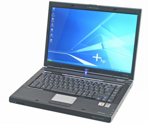 HP Pavilion dv5046EA laptop open and powered on, displaying the Windows desktop on a white background.