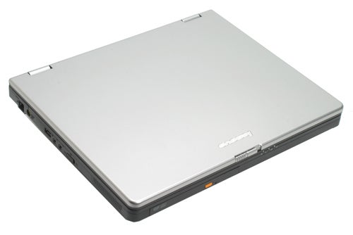Lenovo 3000 C100 laptop closed, showcasing its silver cover with the Lenovo logo on the lower right side, viewed from a slight angle.