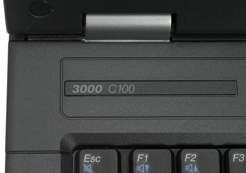 Close-up of Lenovo 3000 C100 laptop showing the area above the keyboard with the model name inscription.
