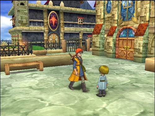 Screenshot from the video game Dragon Quest: The Journey of the Cursed King showcasing two characters, one in a red bandana and orange outfit and another smaller character with blonde hair, standing in front of a castle-like building with a decorated facade.