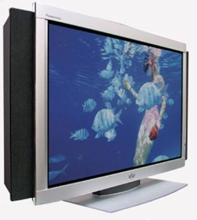 A Fujitsu P63XHA40 63-inch plasma television on a stand displaying an underwater scene with fish and coral.