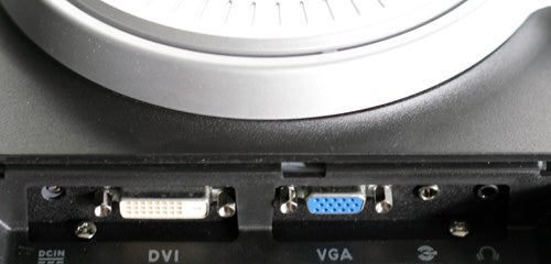 Close-up of the Asus PW191 LCD monitor's port panel showing DC IN, DVI, and VGA connectors.