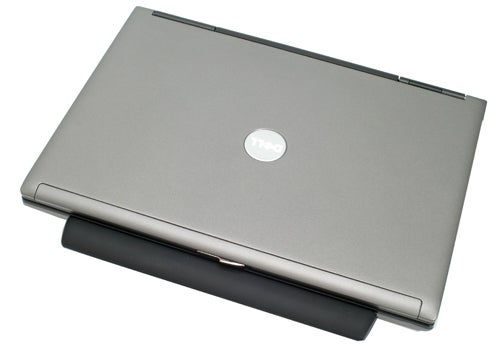 Dell Latitude D620 laptop closed and resting on a flat surface.