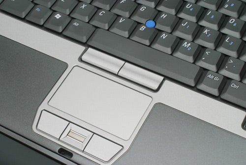 Close-up view of Dell Latitude D620 laptop keyboard and touchpad showing detail of keys and design