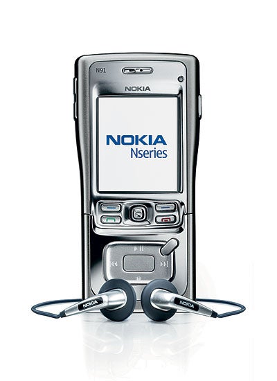 Nokia N91 4GB mobile phone with slide-up screen revealing keypad and multimedia buttons, accompanied by branded earphones.