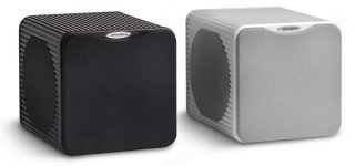 Two small form factor PC cases, black and white, side by side.