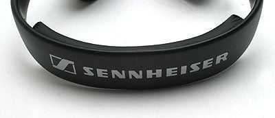 Close-up of the headband of a Sennheiser PC160 Gaming Headset with the Sennheiser logo visible.