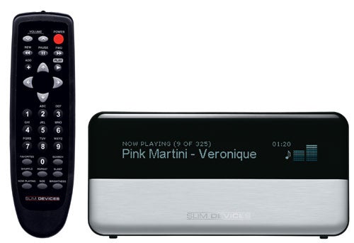 Slim Devices Squeezebox digital music player with a remote control; device display shows 