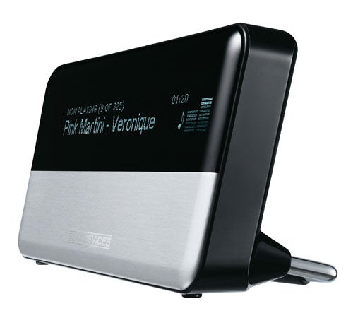 Slim Devices Squeezebox digital music player on a white background displaying the song 