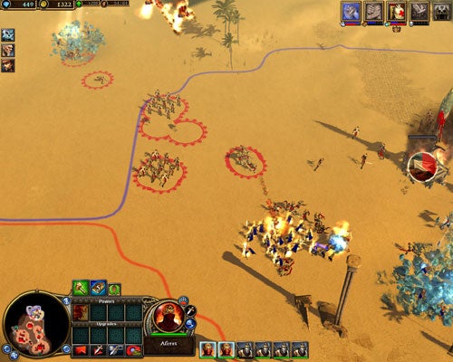 Screenshot of Rise of Legends video game showing an in-game battle with various units and structures on a desert map, including user interface elements like the minimap, unit selection, and abilities.