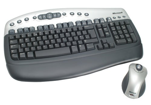Microsoft wireless keyboard and mouse set on white background.