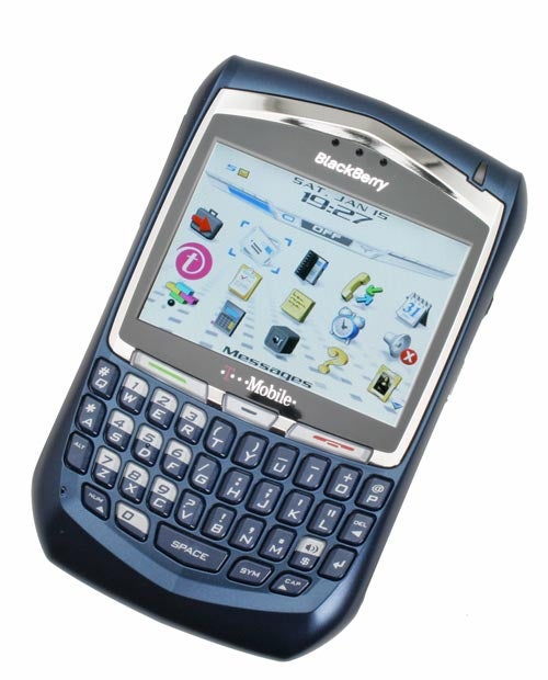 T-Mobile BlackBerry 8700 smartphone with full QWERTY keyboard and color screen displaying menu icons.